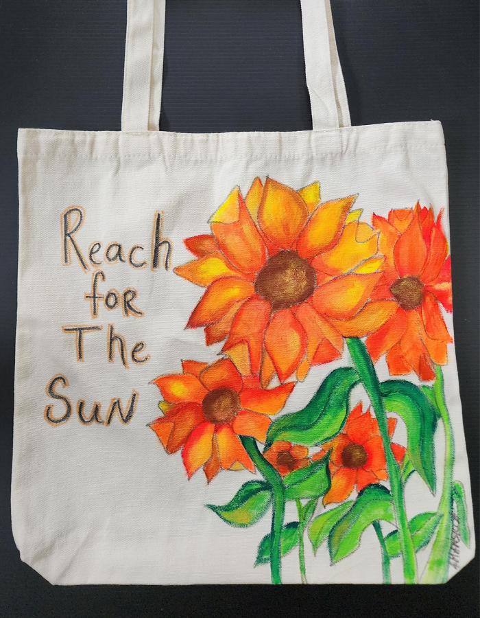 Shop - Reach for The Sun, Black and White Tote Bag by April Mansilla.